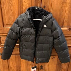 New with tags north face zip jacket with a hood